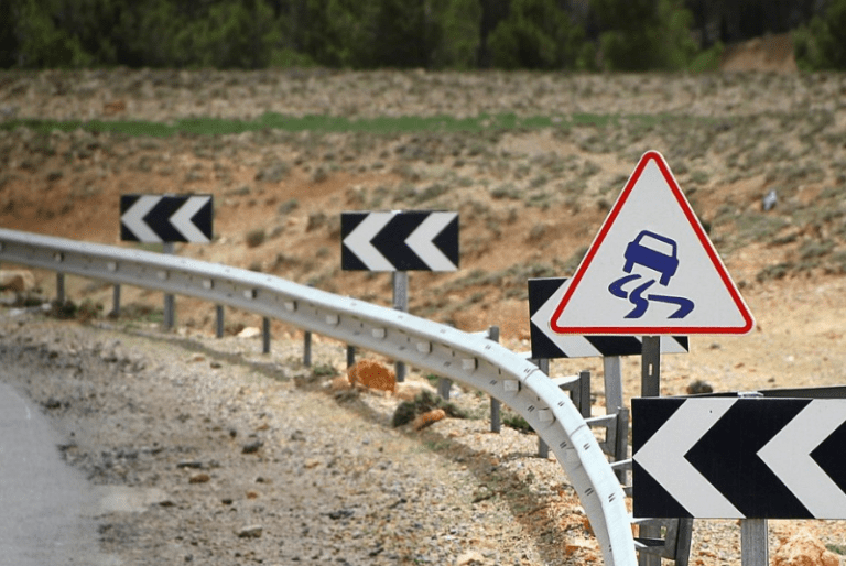 Pivoting on a highway sign