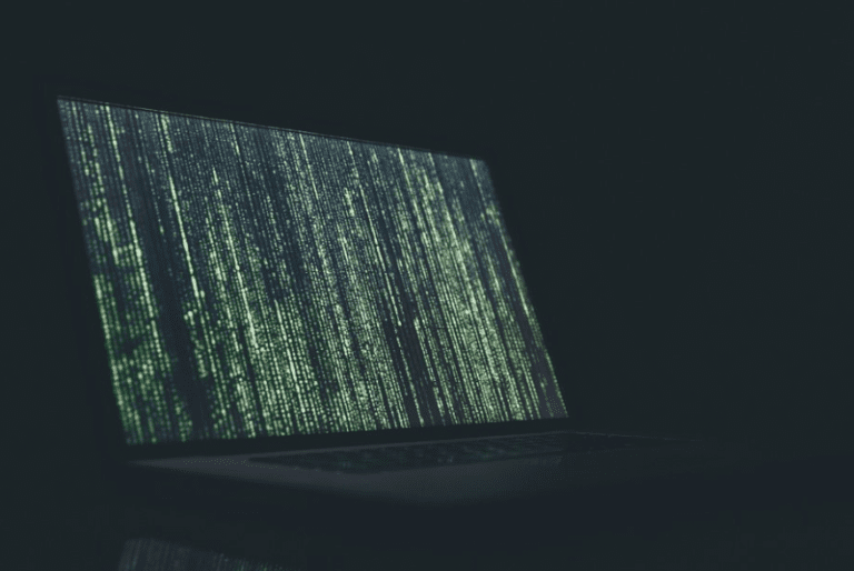 Laptop showing data in the dark